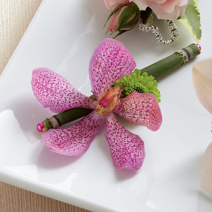 Pink Mokara Boutonniere – FRUIT & FLOWER CREATIONS, Portland OR