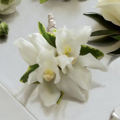 White Mini Cymbidium Boutonniere – FRUIT & FLOWER CREATIONS, Portland OR